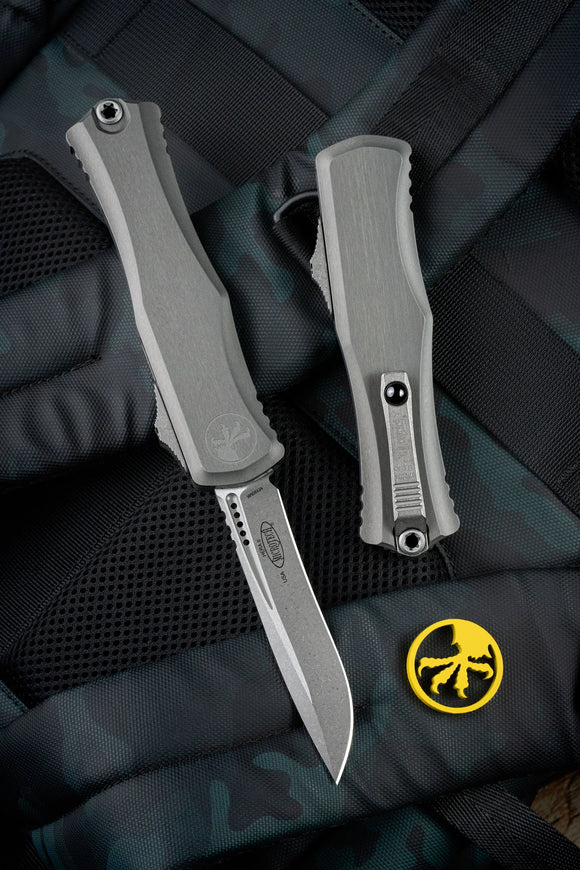 Microtech Hera II Recurve Auto OTF Knife Apocalyptic Bohler M390MK Stainless Steel Blade/Natural Clear Deep Engraved Aircraft Alum. Handle SKU 1705-10APNC