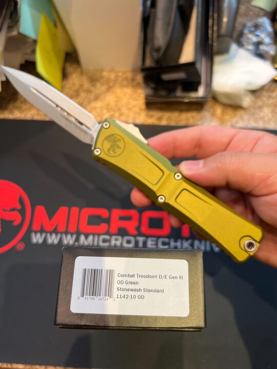 Microtech Combat Troodon Gen III Standard OTF Knife Double Edge M390MK SS Blade/OD Green Alum. Handle SKU 1142-10OD