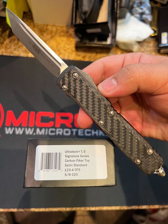 Microtech Ultratech T/E Signature Series OTF Knife Tanto M390 SS Blade/Aircraft Alum. & Carbon Fiber Handle SKU 123-4CFS