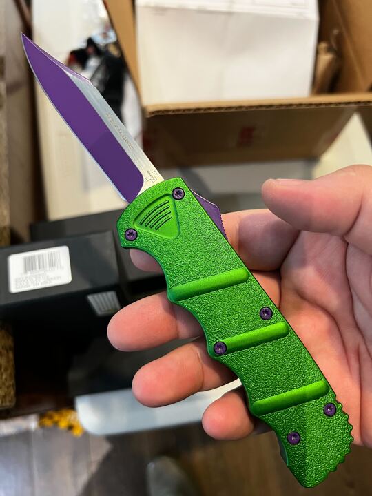 Boker Plus Kalashnikov Joker D/A OTF Knife Purple/Silver D2 SS Blade/ Green Alum. Handle w/Purple Clip & Thumb Slide SKU 06EX359SOI