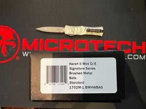 Microtech Hera II Mini Signature Series OTF Knife Black D/E Dagger M390MK SS Blade/Alum. Bat Theme Handle SKU 1702M-1BMHWBAS