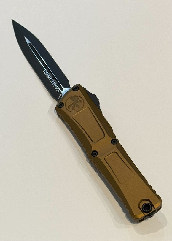 Microtech Combat Troodon Gen III OTF Auto Knife Bohler M390MK SS Double Edge Blade/Tan Aircraft Alum. Handle SKU 1142-1TA