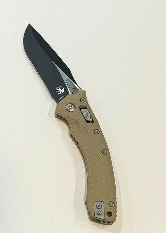 Microtech Amphibian RAM-LOK Manual Folding Knife Bohler M390MK Black SS Blade/Tan Fluted G10 Handle SKU 137RL-1FLGTTA